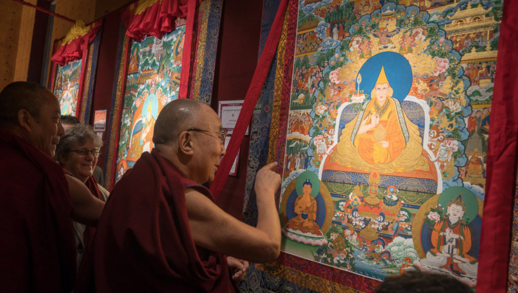 His Holiness the Dalai Lama looking at thangkas depicting the lives of the Dalai Lamas during his visit to Norbulingka Institue in Sidhpur, HP, India on March 9, 2017. Photo by Tenzin Choejor/OHHDL