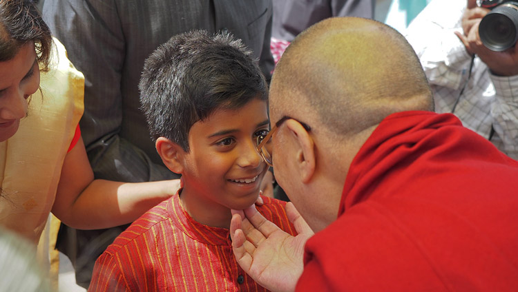 His Holiness the Dalai Lama greeting ML Sondhi's grandson Raghu on his arrival at the India International Centre to receive the Prof ML Sondhi Prize for International Politics in New Delhi, India on April 27, 2017. Photo by Jeremy Russell/OHHDL